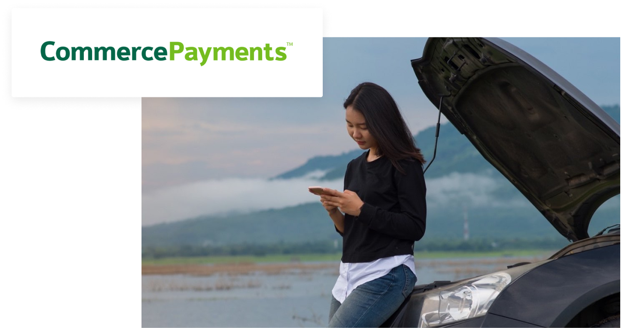 commerce payments logo overlaid on image of person leaning against popped hood of their car, looking at a cell phone