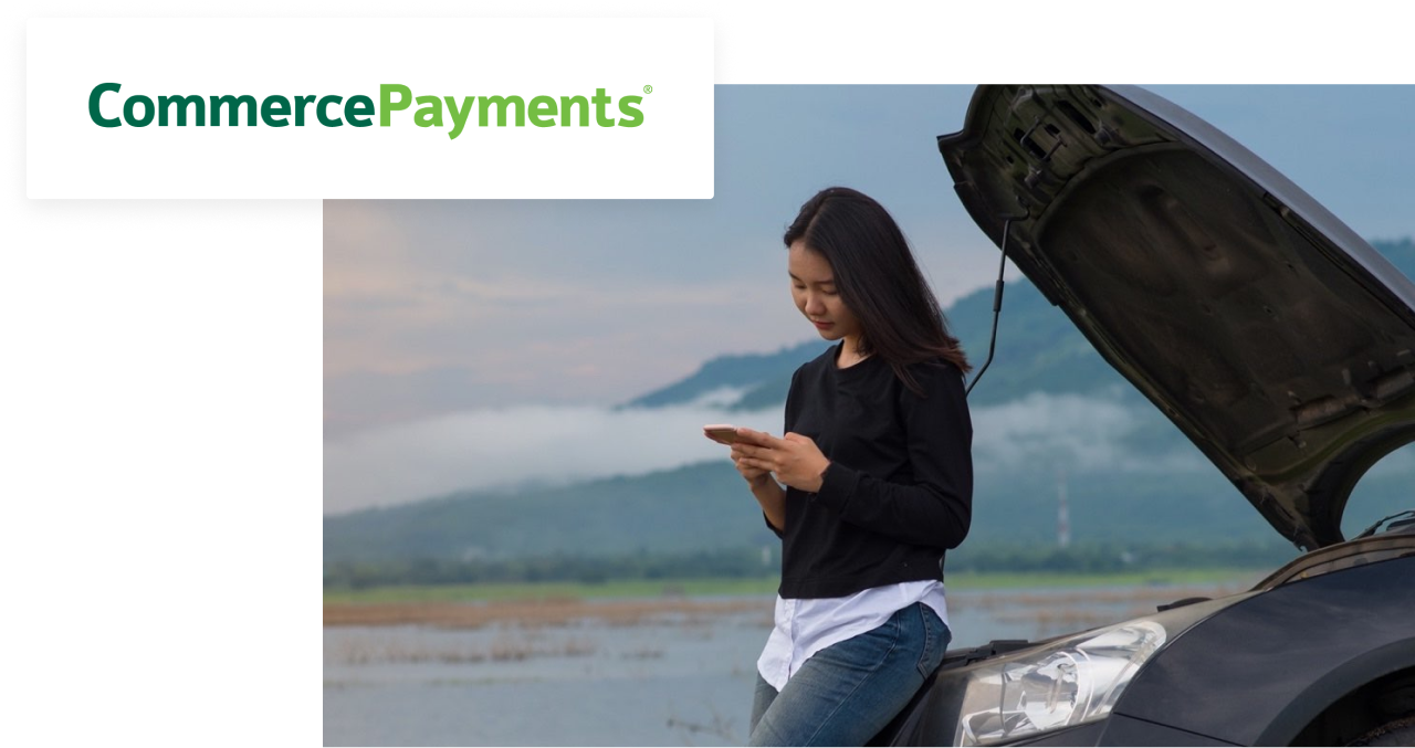 commerce payments logo overlaid on image of person leaning against popped hood of their car, looking at a cell phone